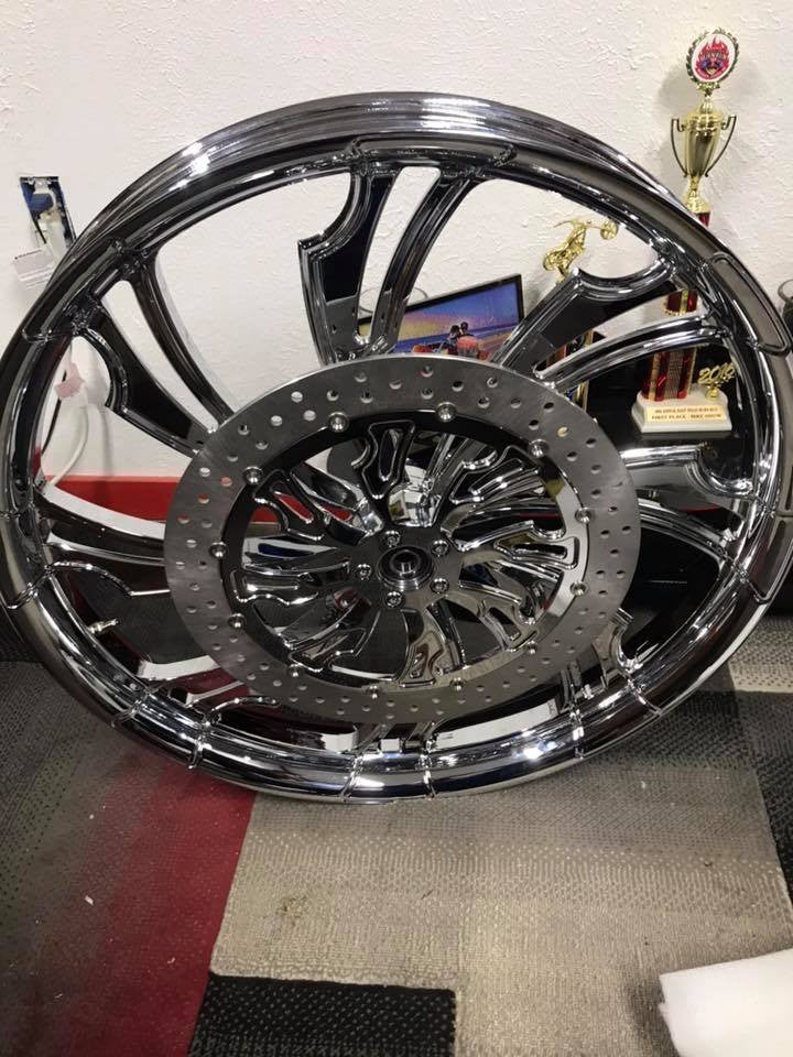 Guinzu matching rotor on motorcycle wheel