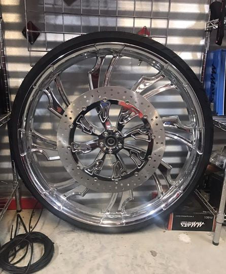 Guinzu matching rotor on motorcycle wheel